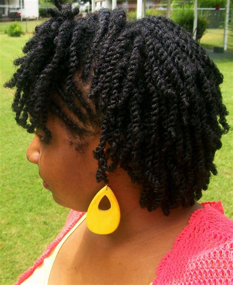 Take a small section on one side of your head, above your ears, and twist it, temporarily clipping it in the back. How To Twist Natural Hair | Video Tutorial | FabWoman