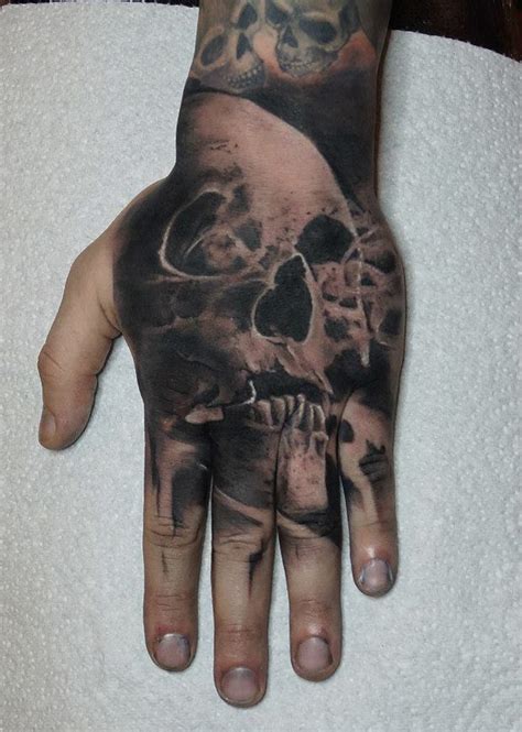 If you're looking to make a bold statement, then you may want to consider these. Hand Skull Tattoo | Best tattoo design ideas