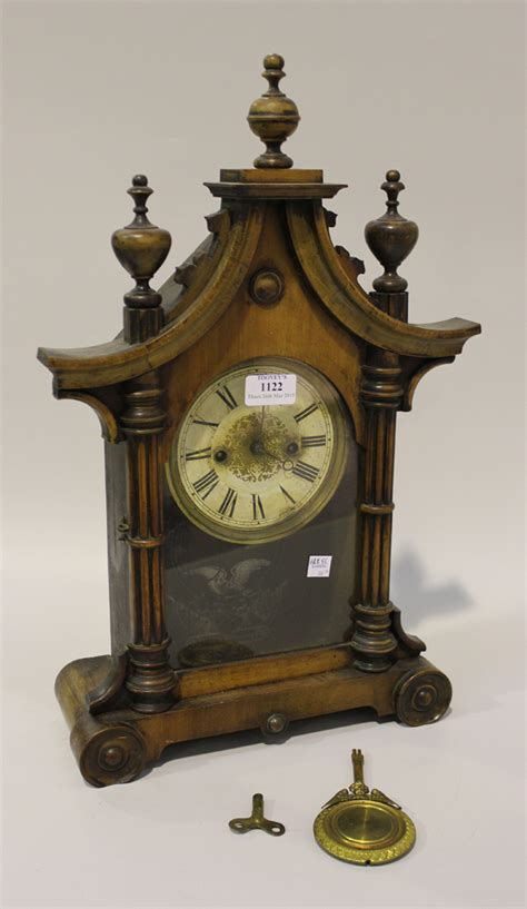 A Late 19th Century German Walnut Mantel Clock With Eight Day Movement