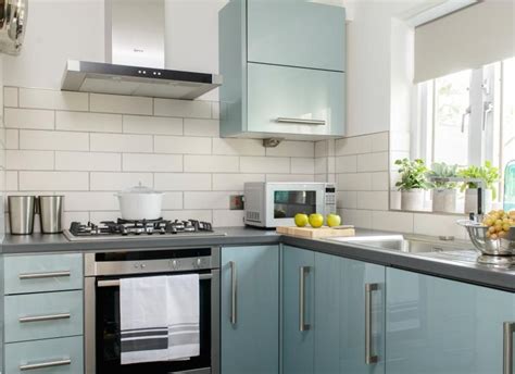 Going dark navy blue bar kitchen design dark blue kitchens. Modern kitchen with blue gloss cabinetry | Kitchen cabinet ...
