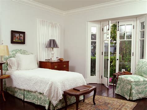 A personified space with linens, simple flower arrangement, touch of gold and white wall paneling, this bedroom interior has a relaxed and stay for a. Modern Furniture: Romantic Bedroom