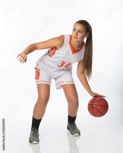 Teenage Girl Dribbling Basketball Buy This Stock Photo And Explore