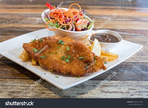 Chicken Schnitzel Chips Gravy Salad Stock Photo Edit Now 1381411535
