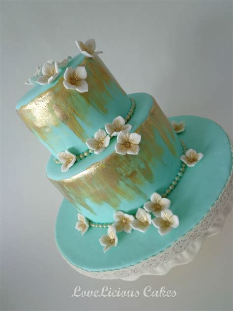 Teal And Gold Cake With White And Gold Sugar Flowers Birthday Cakes
