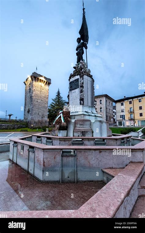 enego the monument to the fallen of the great war and the medieval tower built by the scaligeri