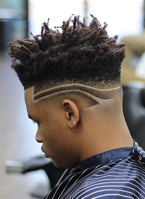 This pompadour with a skin fade is a newer take on the classic style, and it's undoubtedly dapper. Hairstyles for Black Men - 15 Stylish Haircut & Hairstyle ...