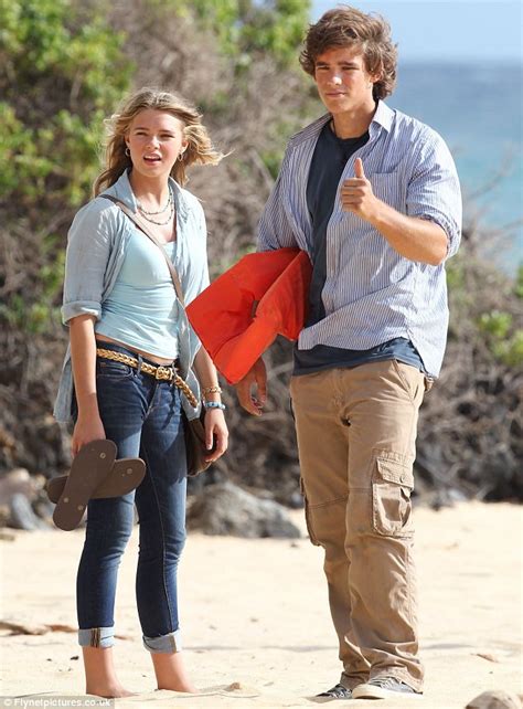 She then took up a correspondence course until she turned 15. Rising star Indiana Evans smoulders in the sand as she ...
