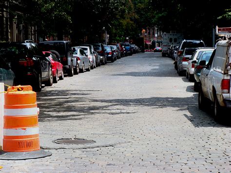 Snapshot Cobblestone Streets Of New York Broken Sidewalk