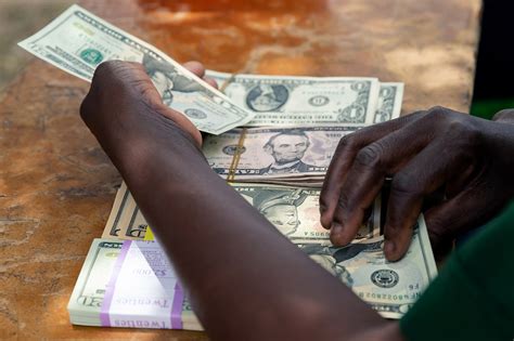 Rapid Dollarization To Stymie Zimbabwes Plan To Drop Greenback Bloomberg