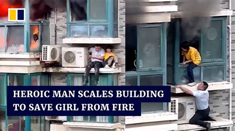 Heroic Chinese Man Scales Building To Save Girl Trapped In Burning Flat