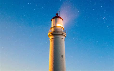 Download Wallpaper 1680x1050 Lighthouse Starry Sky Cape Nelson