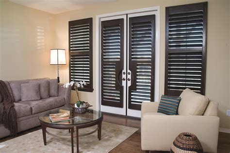 Plantation shutters aren't just for windows. French Door Shutters for Wooden Interior Patio Doors UK