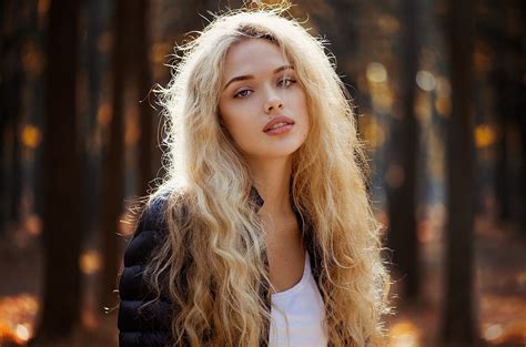 X Women Blonde Cleavage Blue Eyes Looking Away Women Outdoors Hand On Face Long Hair