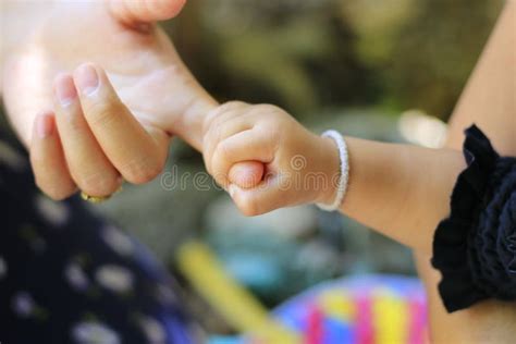 Close To The Child Is Holding An Adult Hand Stock Image Image Of