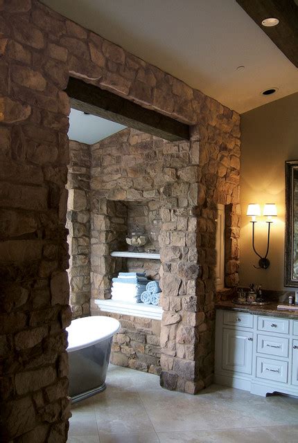 Starting around 50 b.c., the romans chose to add marble veneers to the rubble walls to give them a more lavish appearance. French Country Villa Stone Veneer Bathroom - Coronado ...