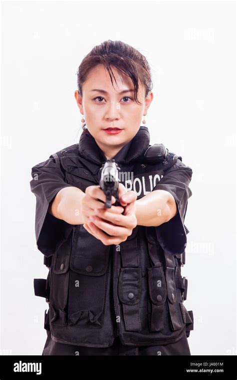 Chinese Female Police Officer Pointing Handgun Stock Photo Alamy