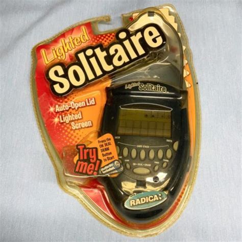 Radica Lighted Lcd Solitaire Handheld Electronic Game 2003 See
