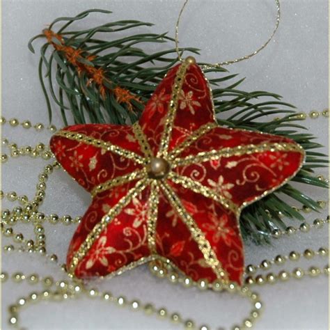 Free Pattern To Make This Pretty Fabric Star Ornament Рождественские