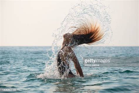 Hair Flip Water Photos And Premium High Res Pictures Getty Images