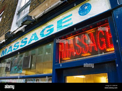 Neon Sign Above The Entrance To A Massage Parlour In Whitcomb Street Near Trafalgar Square