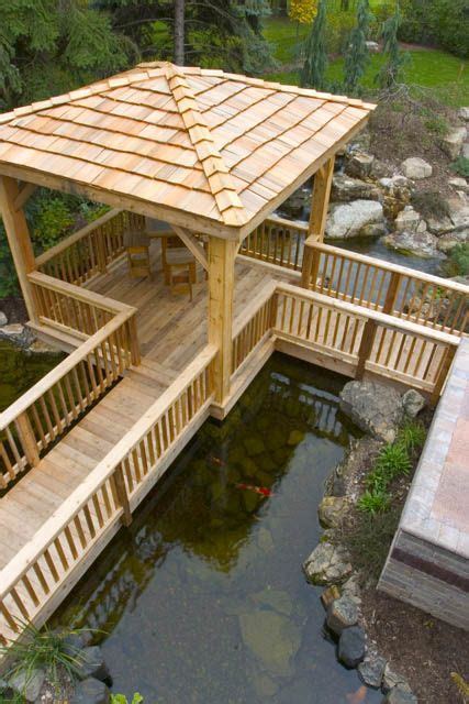 After you install your backyard pond you'll need some fish. A gazebo built in a koi pond. | Ponds backyard, Backyard ...