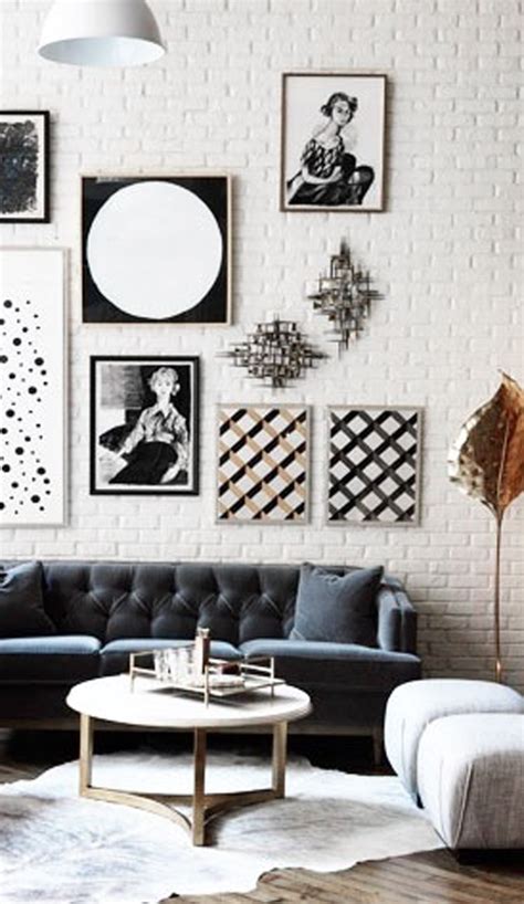 Pick up some inexpensive frames and decorate those blank walls with this creative. black-and-white-gallery-wall-ideas | HomeMydesign