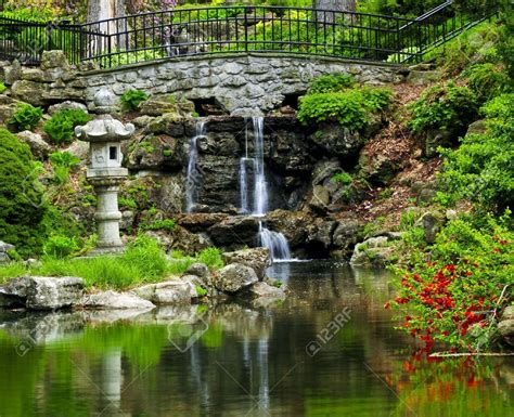 Cascading Waterfall And Pond In Japanese Garden Garden Waterfall