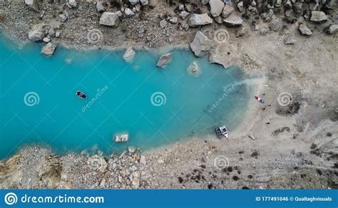 Aerial Top View On Turquoise Water Lake With A Boat Stock Photo Image
