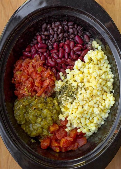Cooking chicken and corn soup by using the readily available cream corn in a can like my mom is the easiest way. Slow Cooker Taco Soup | Simply Happy Foodie