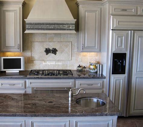 Medallions, custom designed tiles, tiled frame. Mosaic Tile Medallions and Kitchen backsplash Ideas by ...
