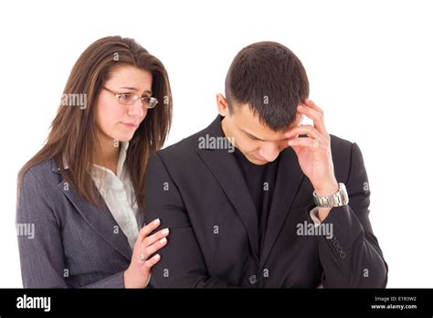 Supporting Woman Consoling And Comforting Sad Worried Man Stock Photo