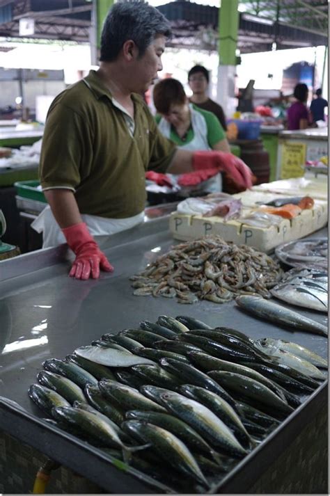 Char kway teow at jalan imbi market, kuala lumpur. Seafood vendor at Jalan Imbi Market, Kuala Lumpur ...