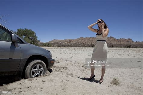 Woman Car Stuck In Sand High Res Stock Photo Getty Images