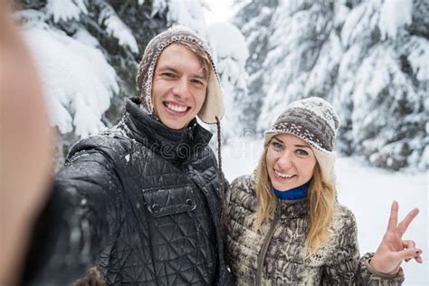 Man Taking Selfie Photo Young Romantic Couple Smile Snow Forest Outdoor