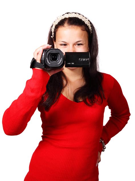 Woman Holding A Black Video Camera · Free Stock Photo