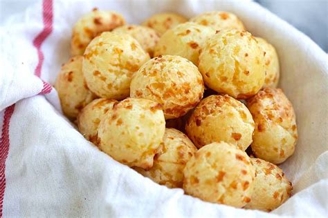 brazilian cheese puffs fully loaded pão de queijo with parmesan cheese these cheese puffs are