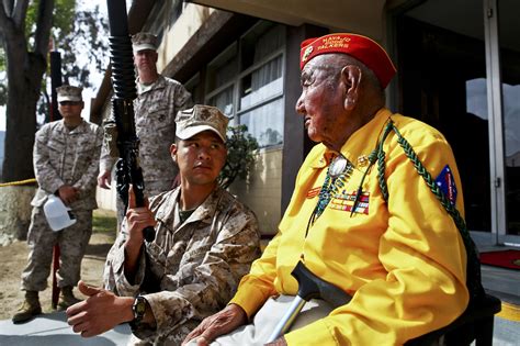 marine corps lance cpl nicholas kien left shows samuel tsosie a retired marine who served as