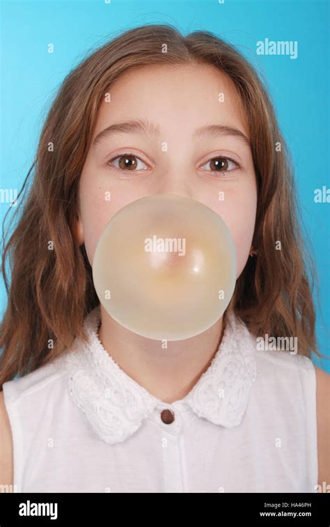 Portrait Of A Girl Blowing Bubble Gum Hi Res Stock Photography And