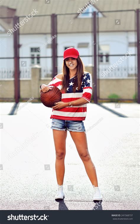 Sexy Brunette Woman Holding Basketball Hand Stock Photo 241568737