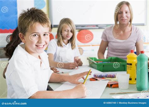 Schoolchildren And Their Teacher In An Art Class Stock Photo Image Of
