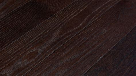 Smooth flooring may dent and scuff more easily than textured flooring. White Oak Dark Stain Hand-Scraped Engineered Floors