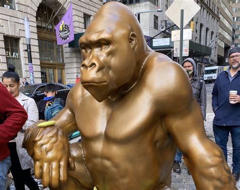 A 7 Foot Tall Gorilla Statue Is Now Facing The Charging Bull By Wall Street