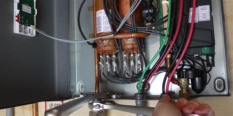 Wait to hear the button click. Tankless Water Heater Cabin DIY