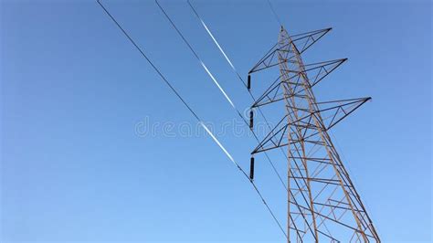 Electricity Transmission Towers With Glowing Wires Stock Photo Image
