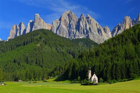 San Giovanni Church In Front Of Dolomites Mountain Peaks Stock Image