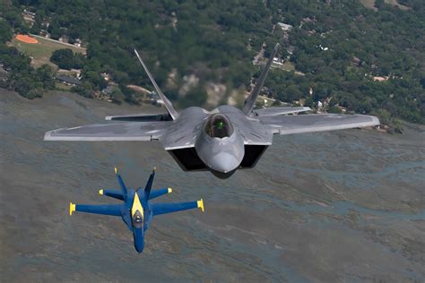 F 22 Raptor Fighter Jet Makes Historic Flight With Blue Angels