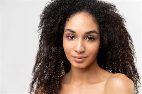 Treatment And Care Portrait View Of The Gorgeous Curly Multiracial Woman With Naked Shoulders