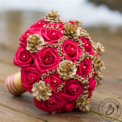 White, plum and gold bridal bouquet. Red and gold pine cones winter holiday wedding bouquet ...