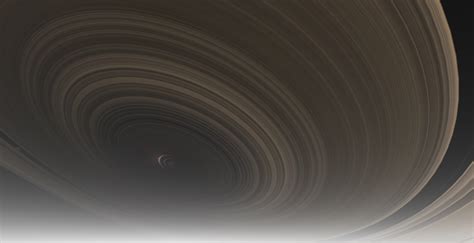 Artist's conception of the extrasolar ring system circling the young giant planet or brown dwarf j1407b. File:J1407b seen from its exomoon.png - Wikimedia Commons