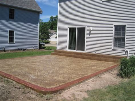 Check spelling or type a new query. Patio in Random Stone pattern with Brick Border. | Stamped ...